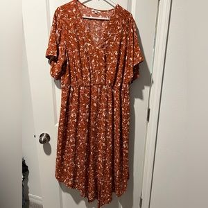 Orange maxi dress with floral design